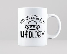 Listing image for Expert UFOlogy Mug Gift Funny UFO Conspiracy Roswell Aliens Space Tea Coffee Cup